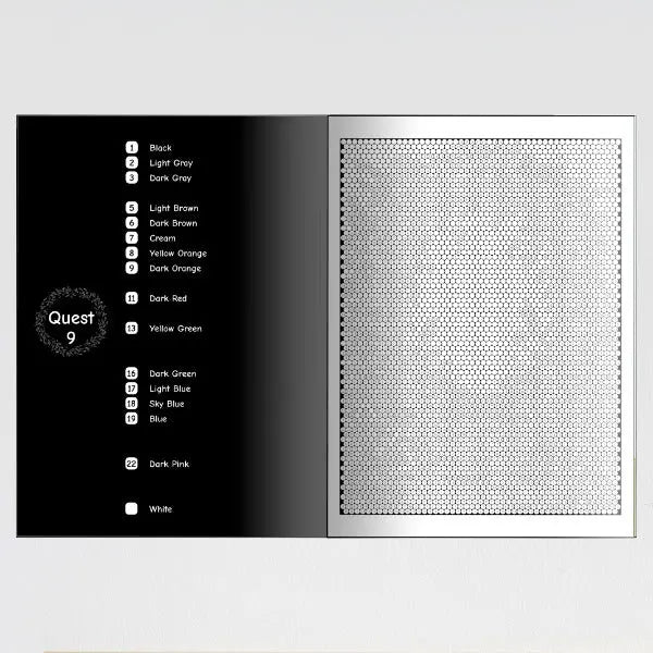 An open color by number book showing a page with a color key on the left and a blank mosaic pattern on the right.