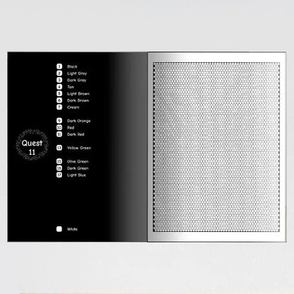 An open color by number book showing a page with a color key on the left, listing numbers and corresponding colors, and a blank mosaic pattern on the right.