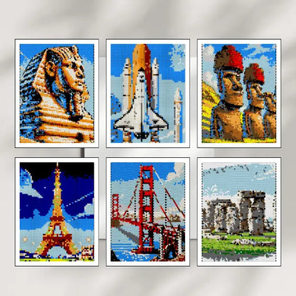 Six completed color by number mosaic artworks in white frames, depicting famous world landmarks: the Sphinx, Space Shuttle, Easter Island Moai, Eiffel Tower, Golden Gate Bridge, and Stonehenge.